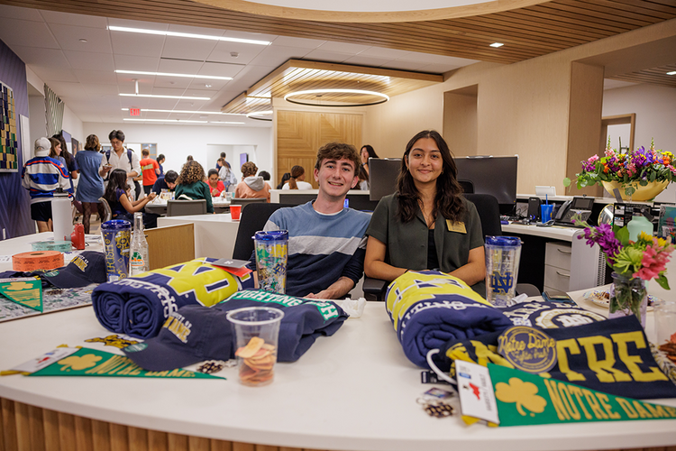 Student leaders hosting the giveaways station at the Grand Opening of the Center for DEI.